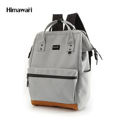 vista lateral bolso gris claro mochila para dama