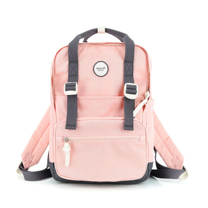 vista lateral mochila rosa impermeable para dama