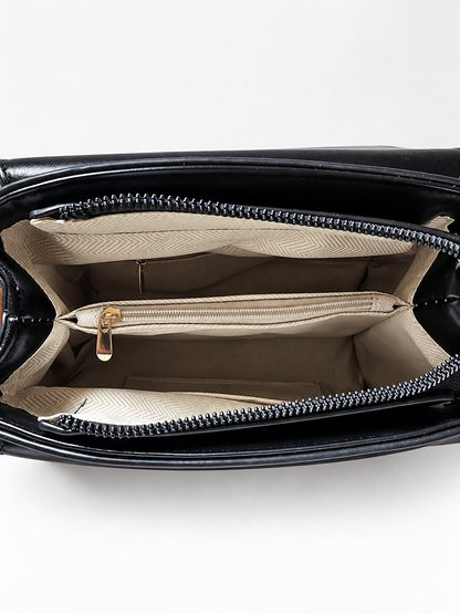 Bolso negro para mujer detalle de compartimentos interiores