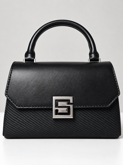 Bolso negro para mujer vista frontal con broche plateado