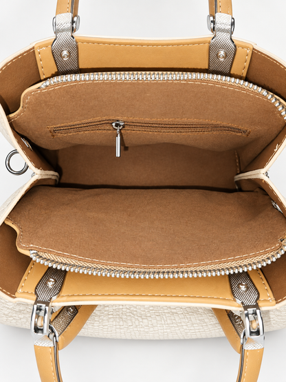 Bolso de mano beige para mujer detalle interior con bolsillo y cremallera