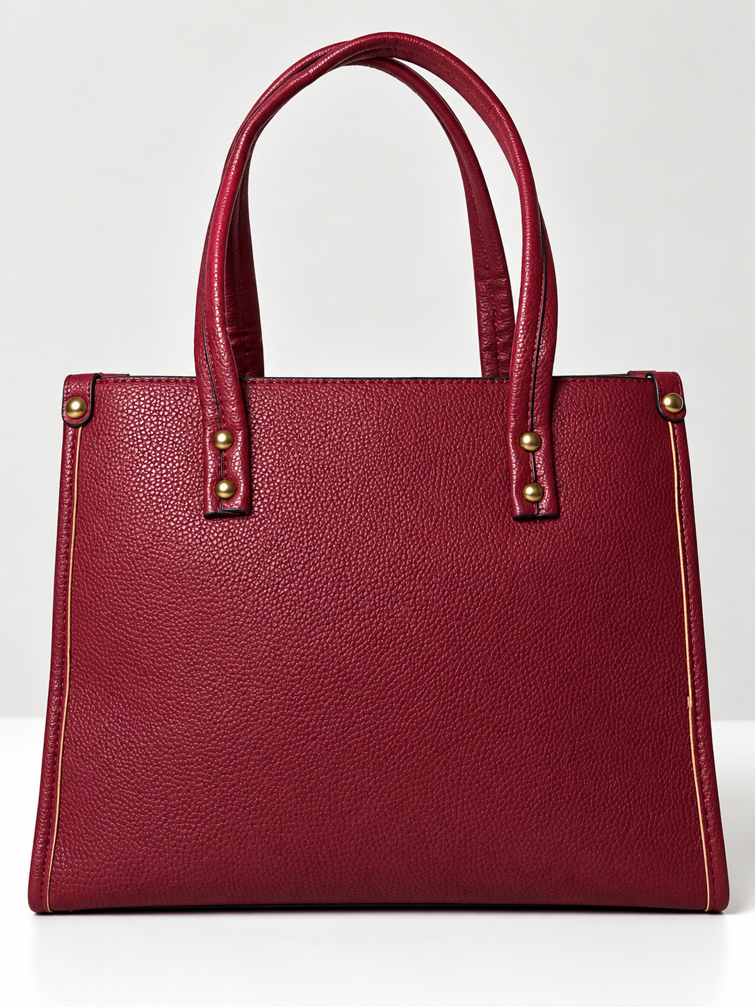 Bolso de mano rojo para mujer vista posterior con acabado texturizado