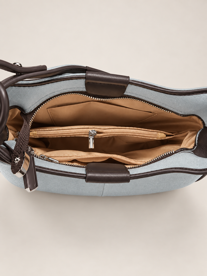 Bolso de hombro celeste para mujer – detalle de compartimentos interiores