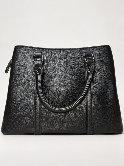 Bolso tote negro para mujer vista posterior y acabado texturizado