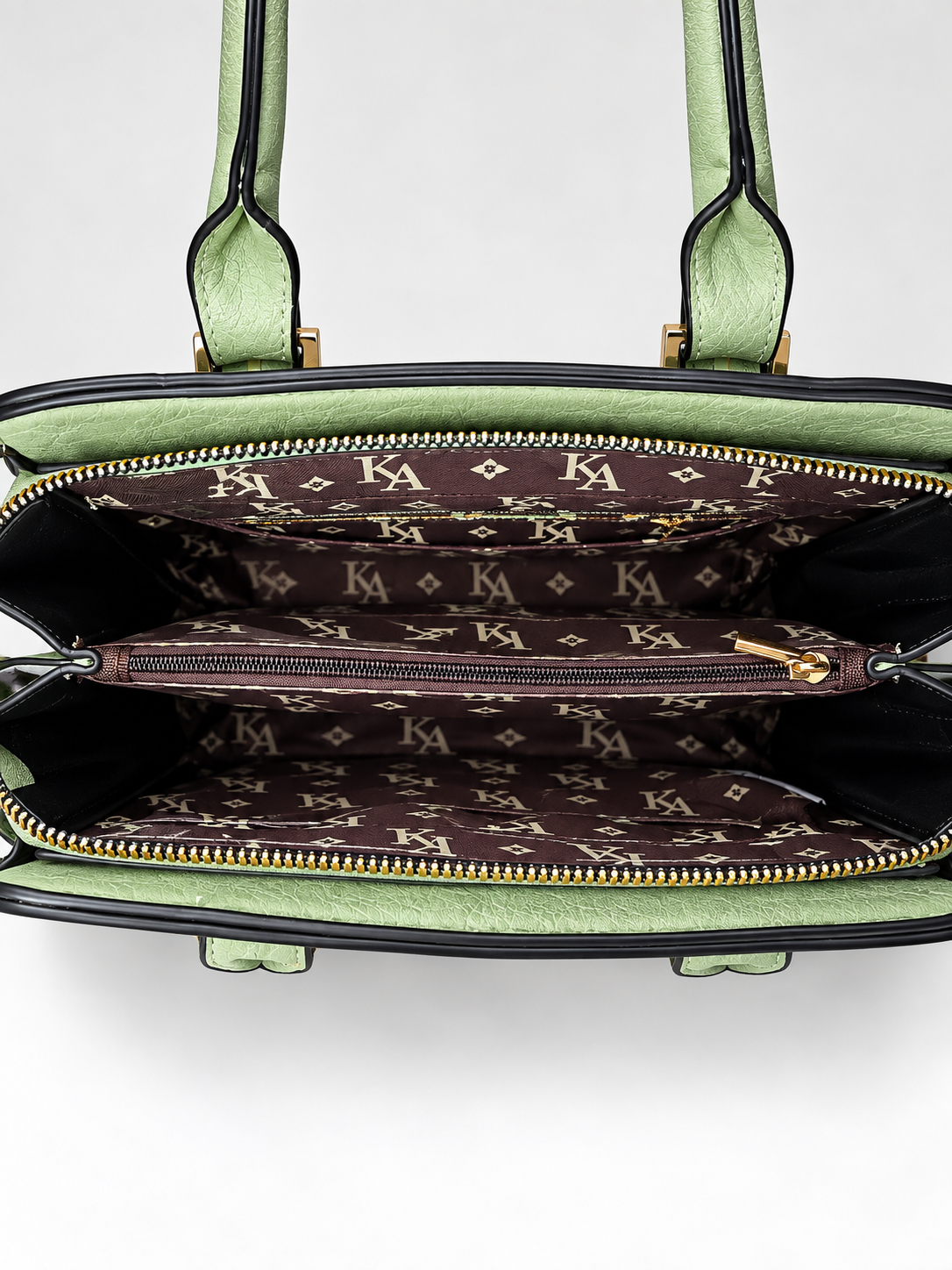 Bolso verde menta para mujer detalle de compartimentos interiores