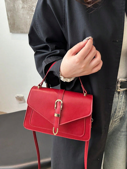 correa ajustable del bolso burdeos elegante

