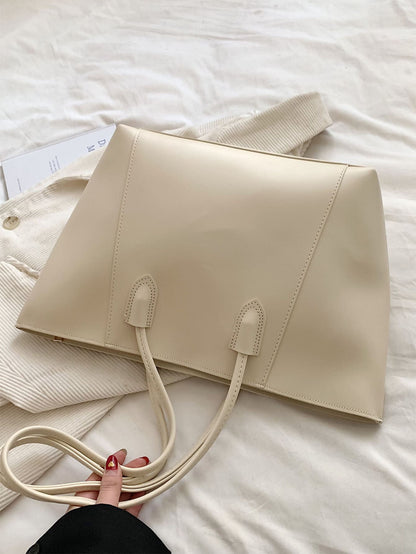 bolso tote beige para mujer vista posterior con doble asa larga