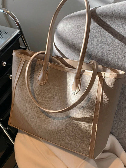Bolso tote gris taupe para mujer vista frontal texturizada