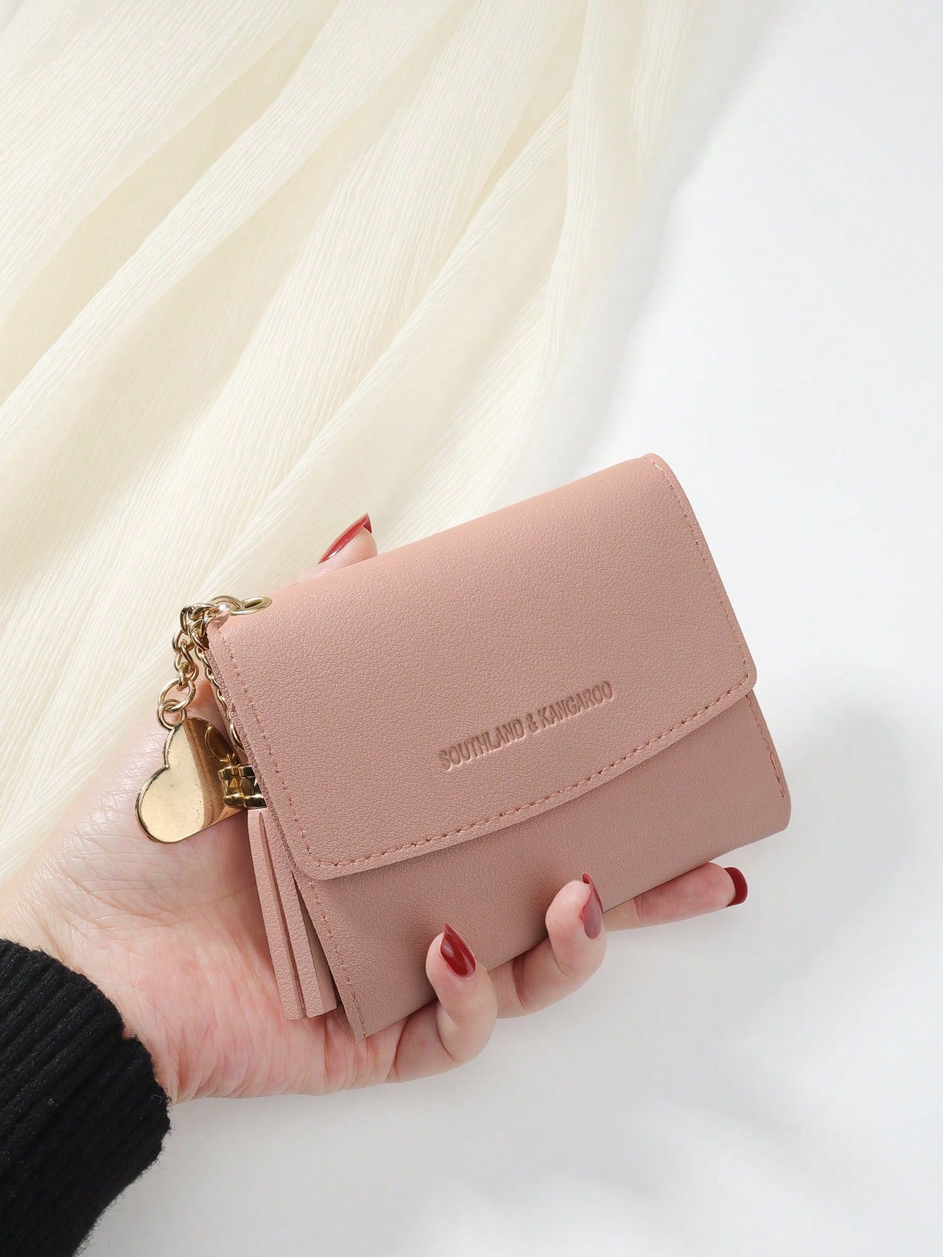 cartera rosa compacta para dama
