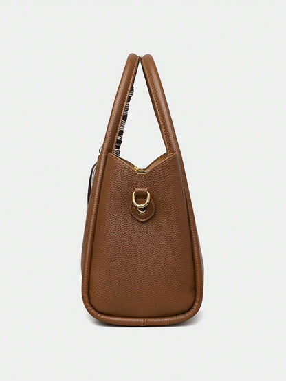 bolso cubo marrón para mujer vista trasera con textura granulada