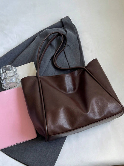 bolso café de hombro para dama estilo minimalista