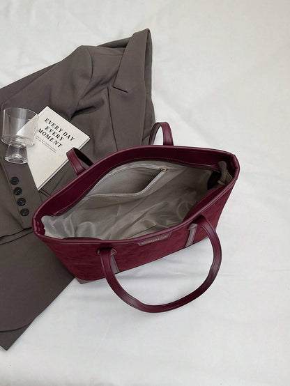 Bolso tote burdeos para mujer detalle del interior y bolsillo