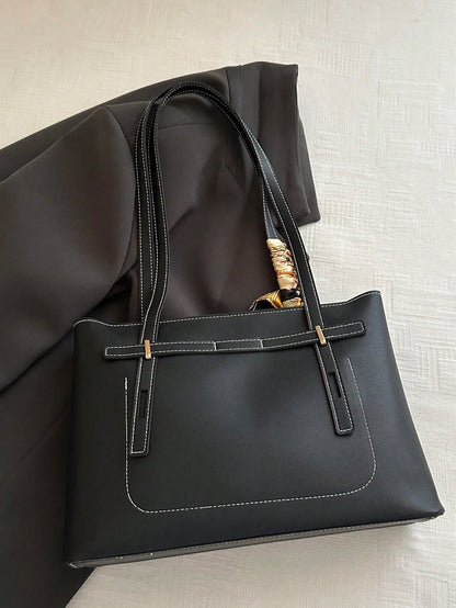 bolso tote negro para mujer vista trasera con costuras en contraste
