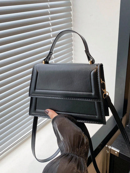 mini bolso negro de cuero sintético para dama