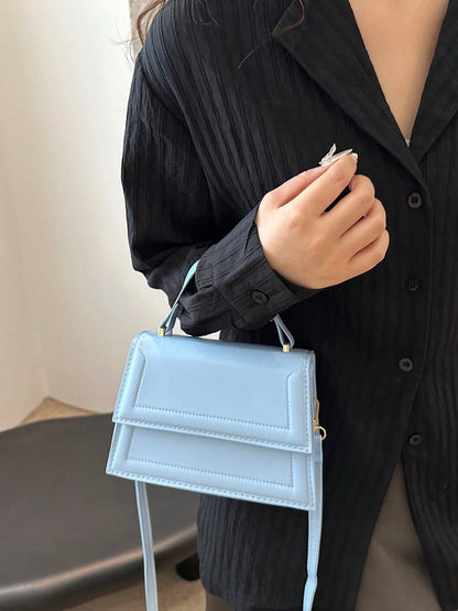 bolso azul mini con asa superior