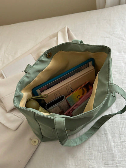 bolso tote verde para mujer vista superior con interior amplio