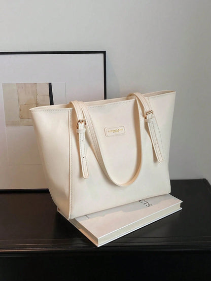 Bolso tote marfil para mujer vista frontal con asas ajustables