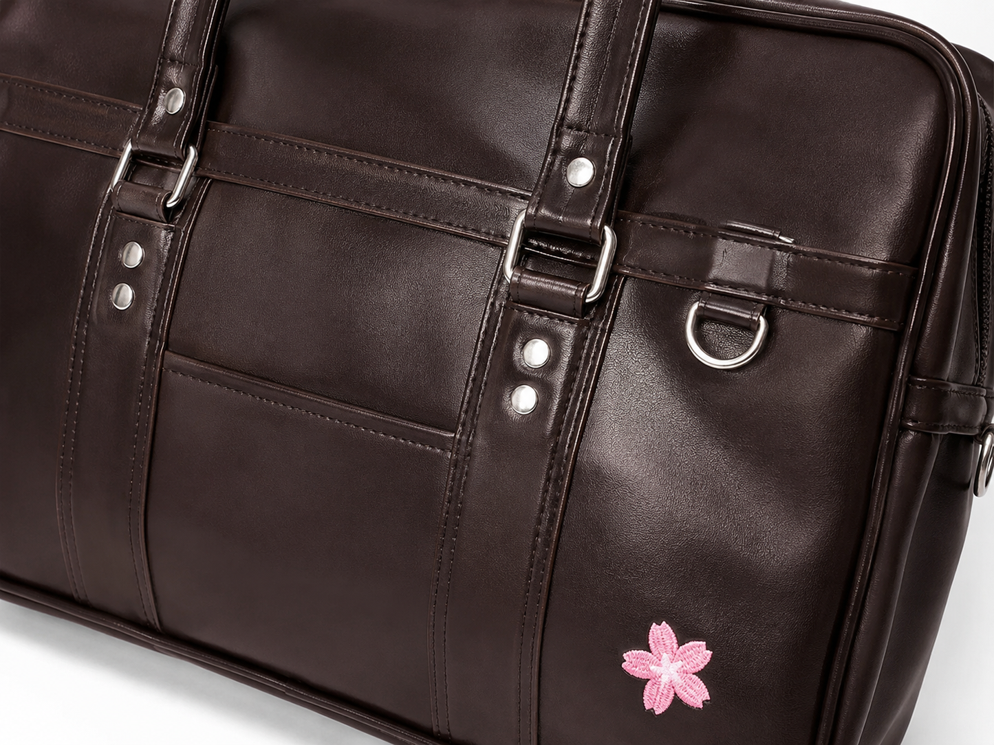 Bolso tote marrón mocha para mujer detalle de herrajes y acabado liso