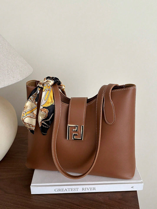 bolso marrón tipo tote para dama