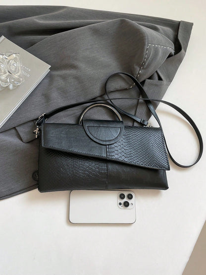 bolso de mano negro para mujer vista frontal con correa larga
