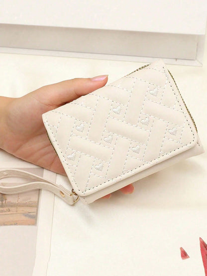 billetera blanca compacta para dama con diseño bordado