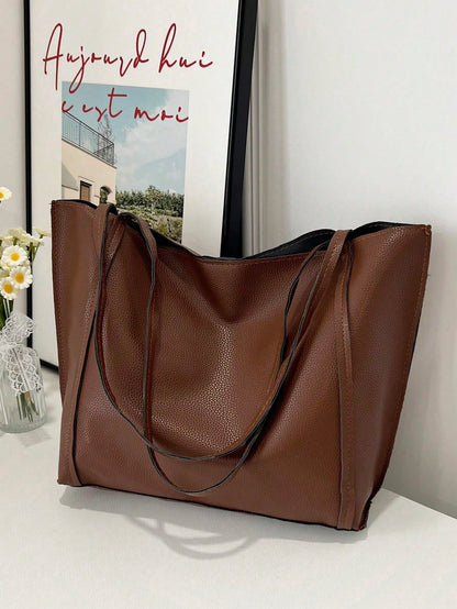 Bolso tote marrón para mujer vista frontal con diseño flexible