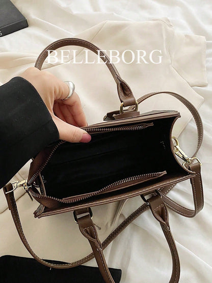 Bolso azul para mujer con compartimentos interiores y cierre de cremallera