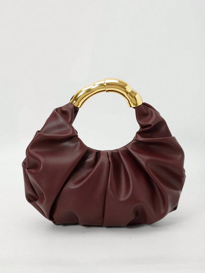 asa metálica dorada del bolso hobo