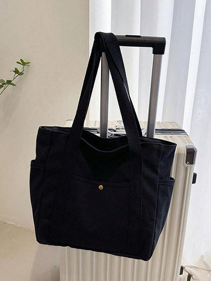 bolso tote beige vista lateral con bolsillos exteriores