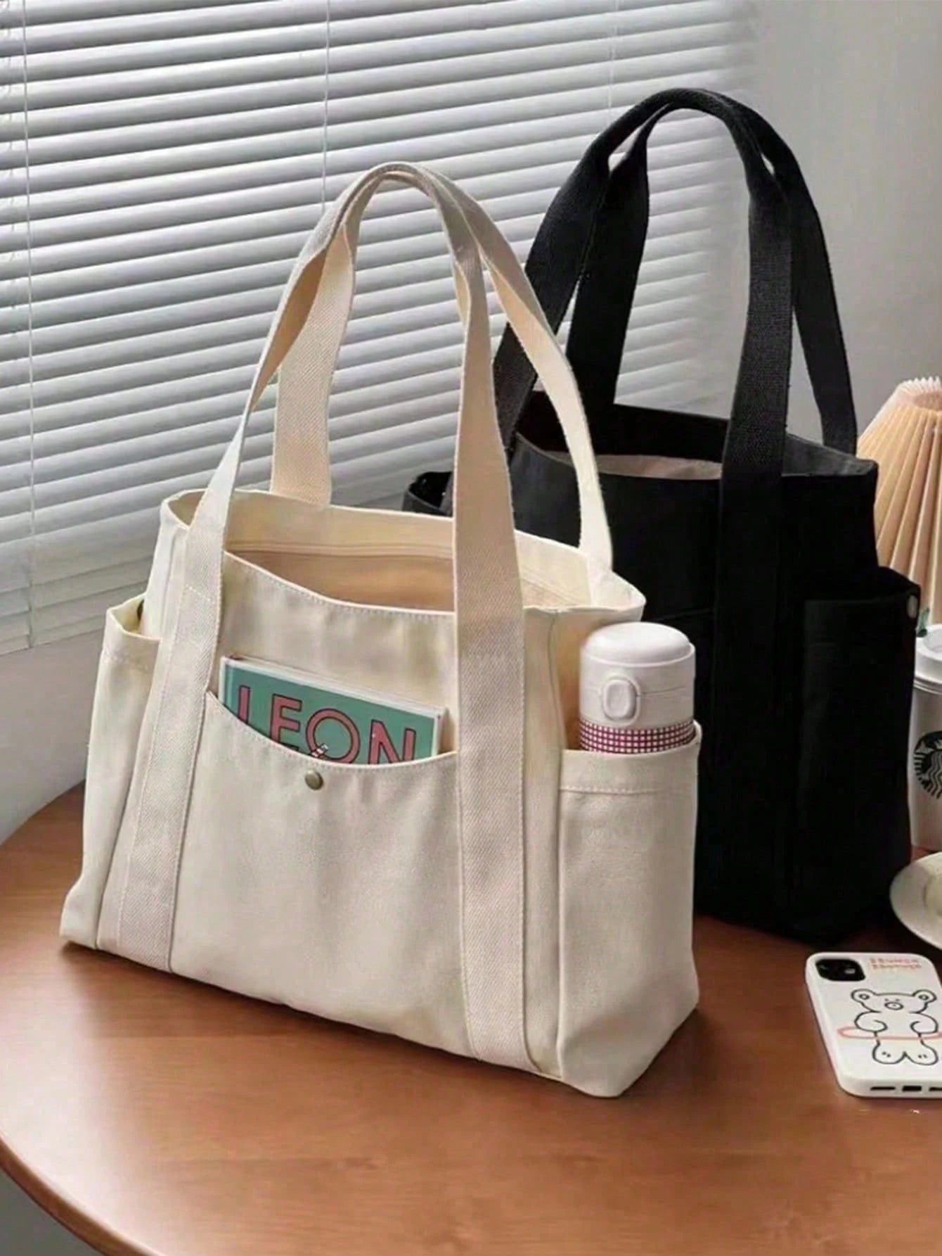 bolso beige tipo tote para dama con múltiples bolsillos