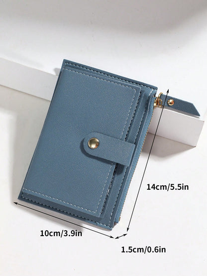 billetera azul pequeña con medidas 14 x 10 cm