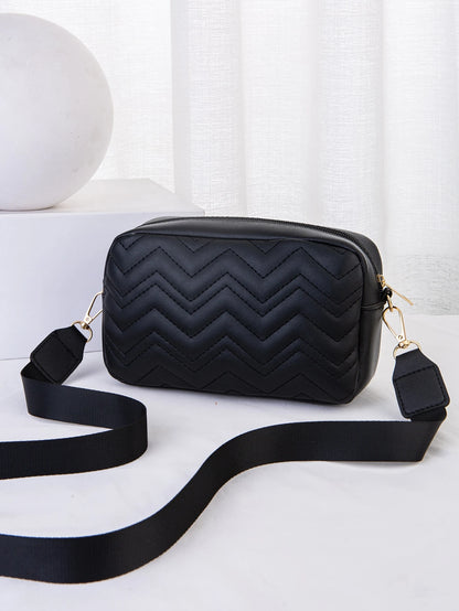 vista trasera del bolso negro acolchado para dama